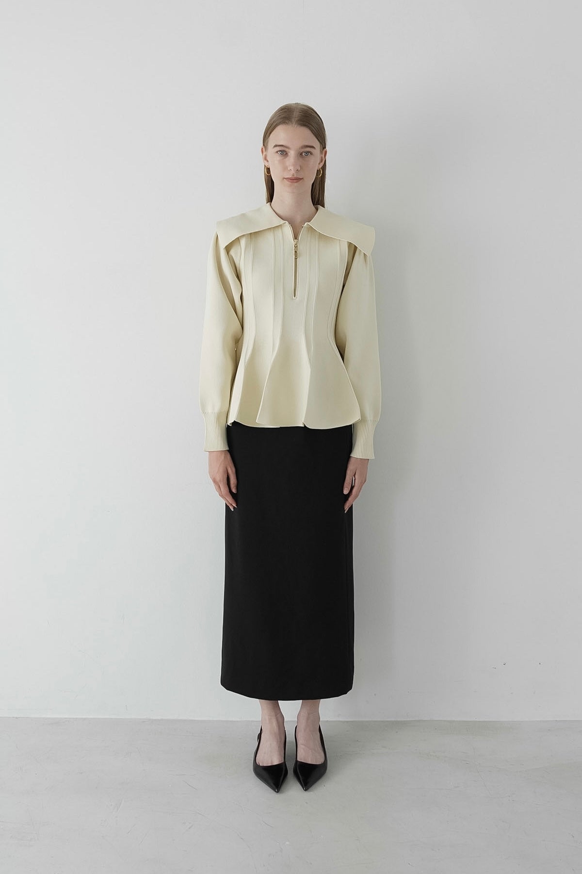peplum zip knit tops