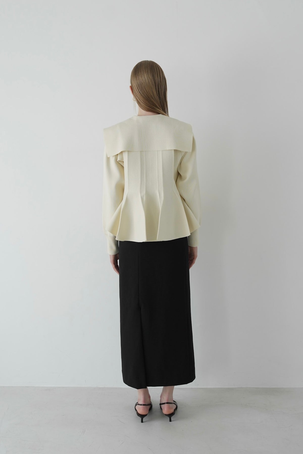 peplum zip knit tops