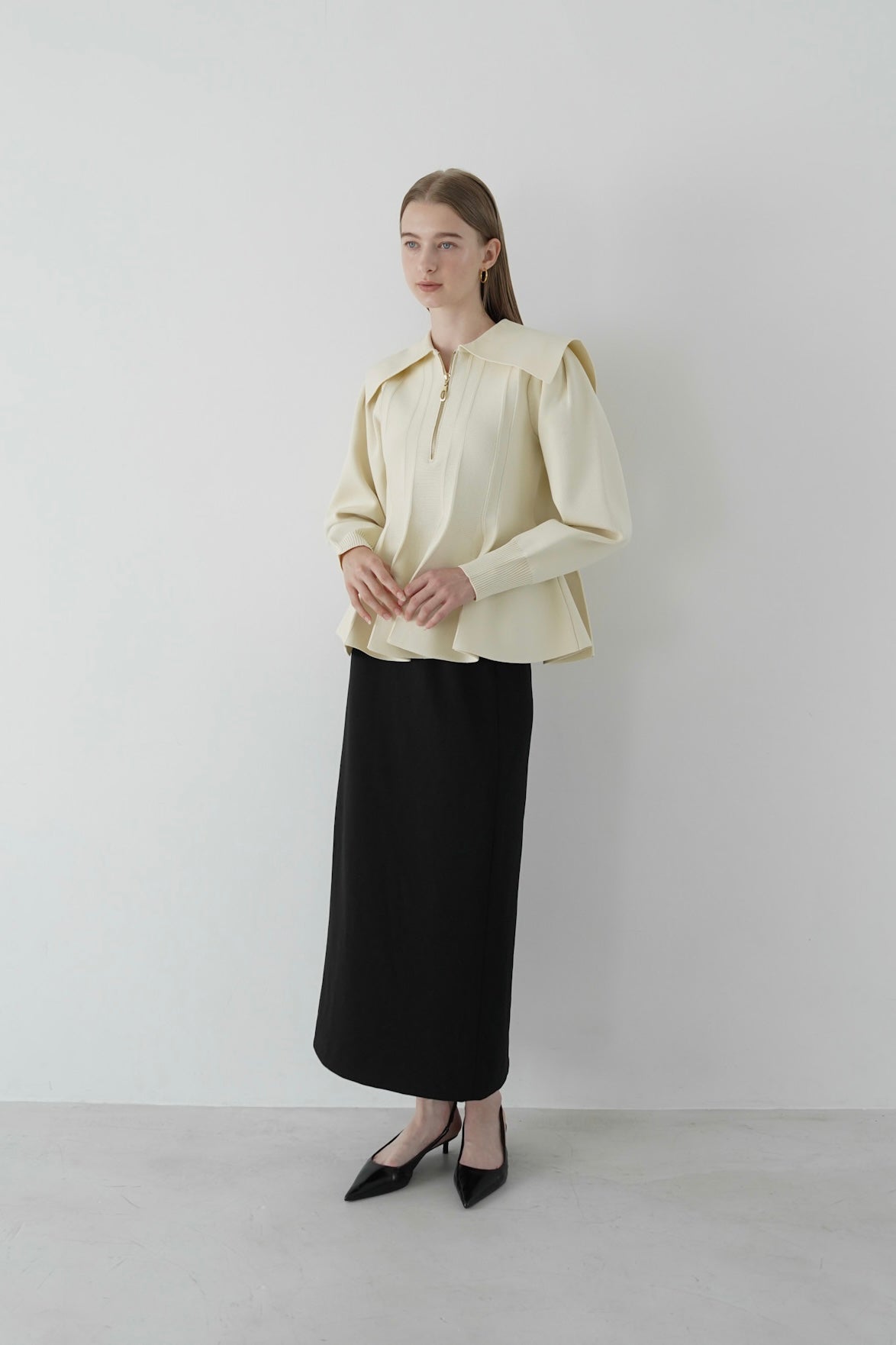 peplum zip knit tops
