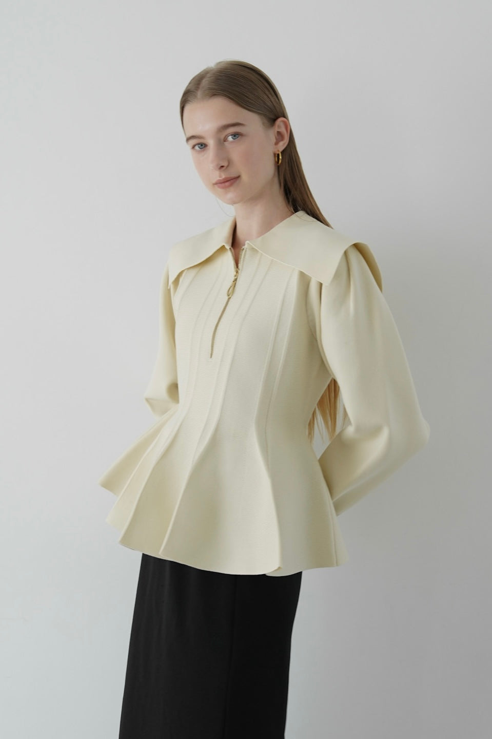 peplum zip knit tops