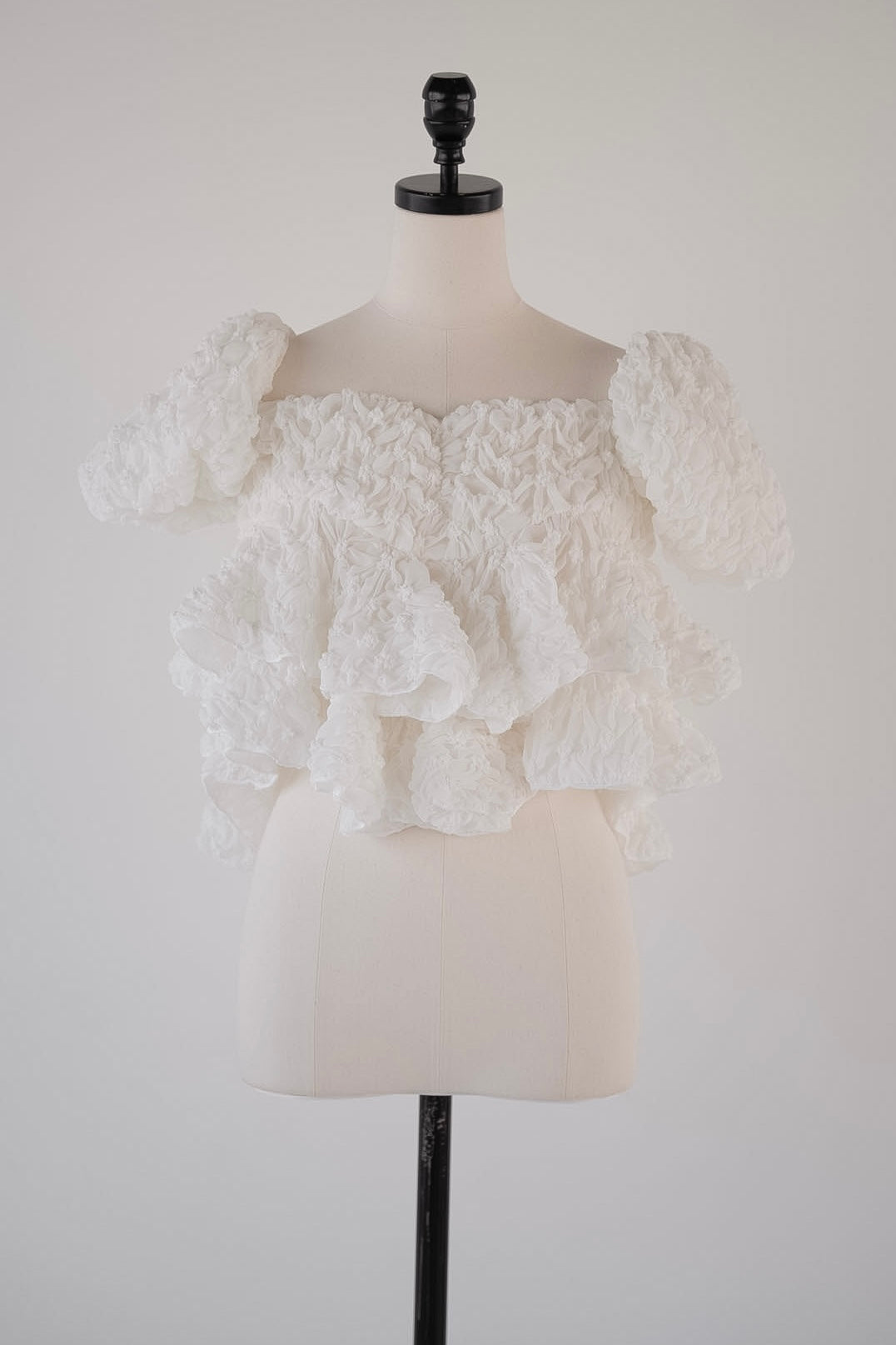 volume peplum tops