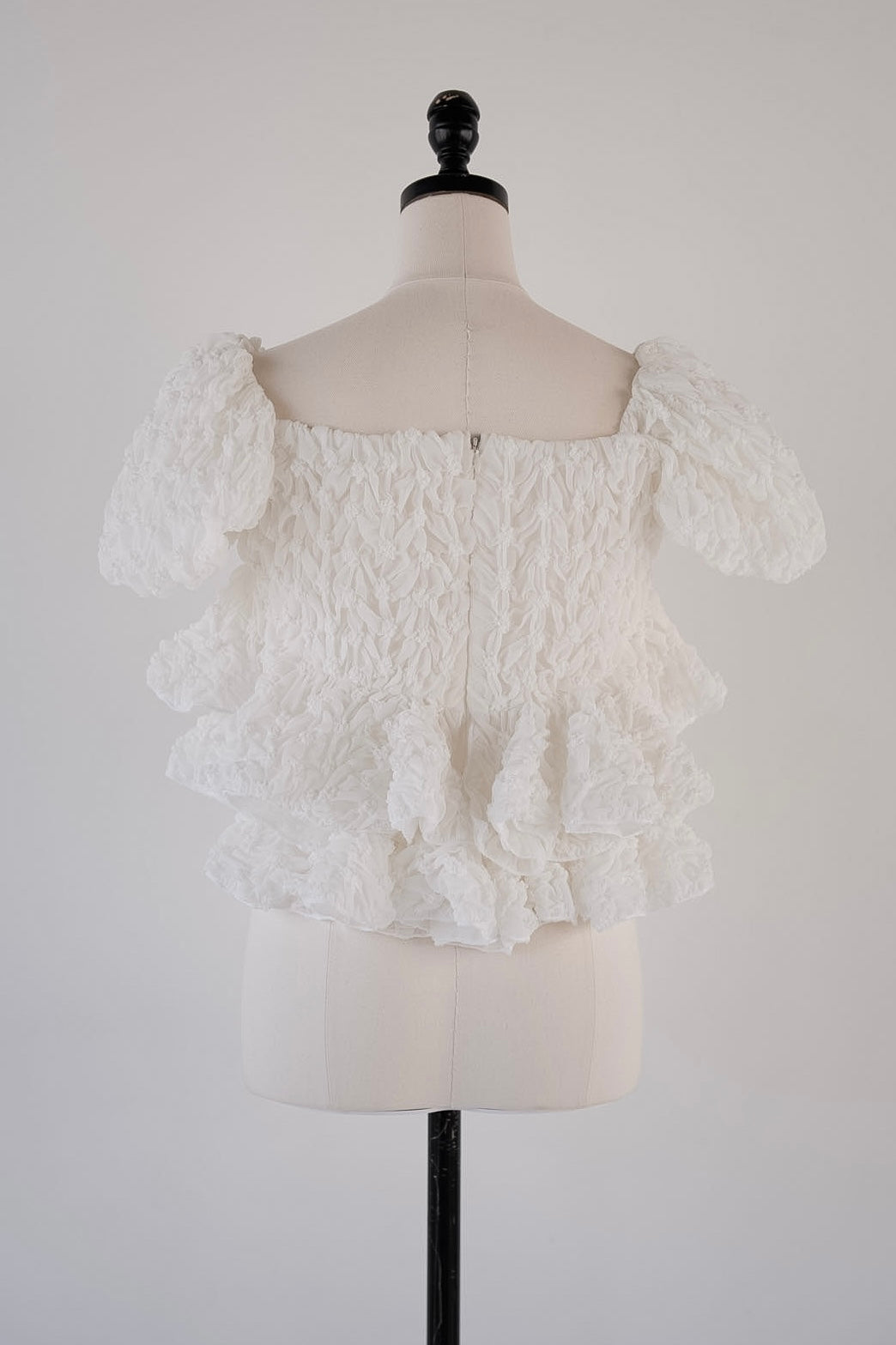 volume peplum tops