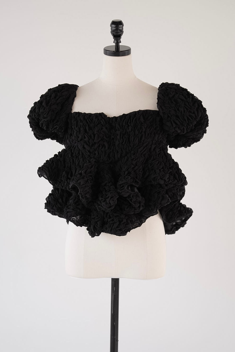 volume peplum tops