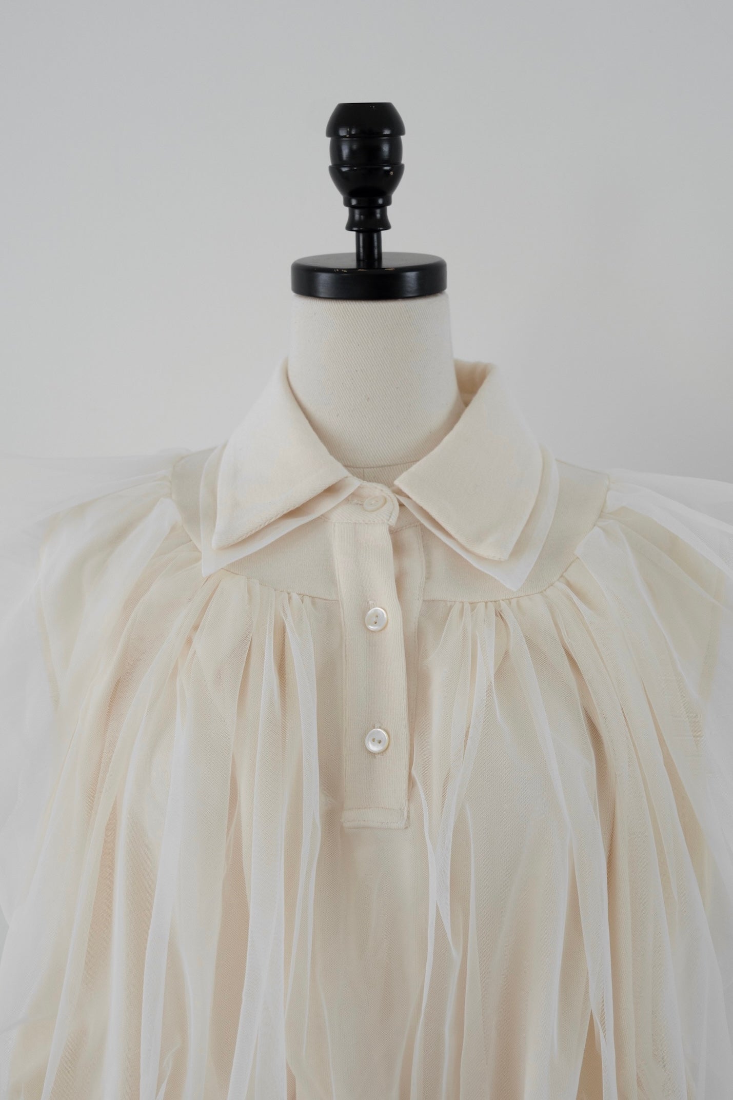 compact tulle polo tops