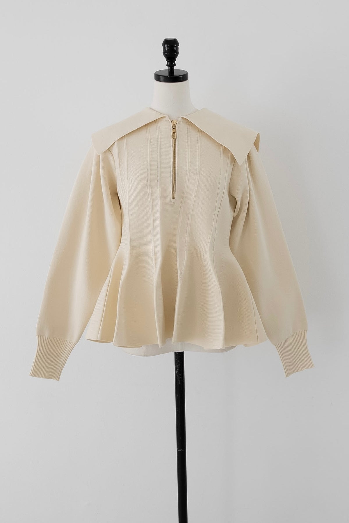 peplum zip knit tops