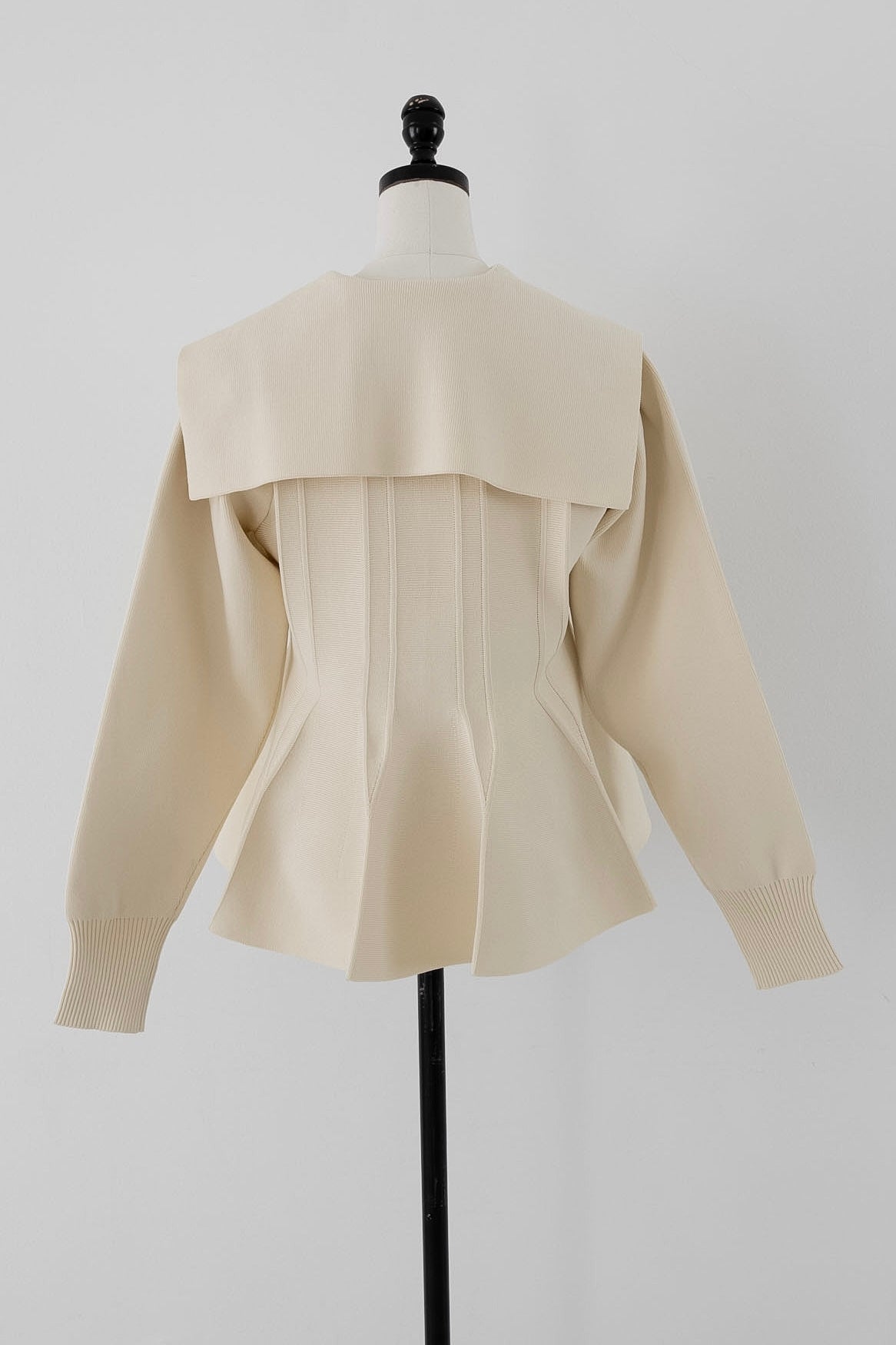 peplum zip knit tops