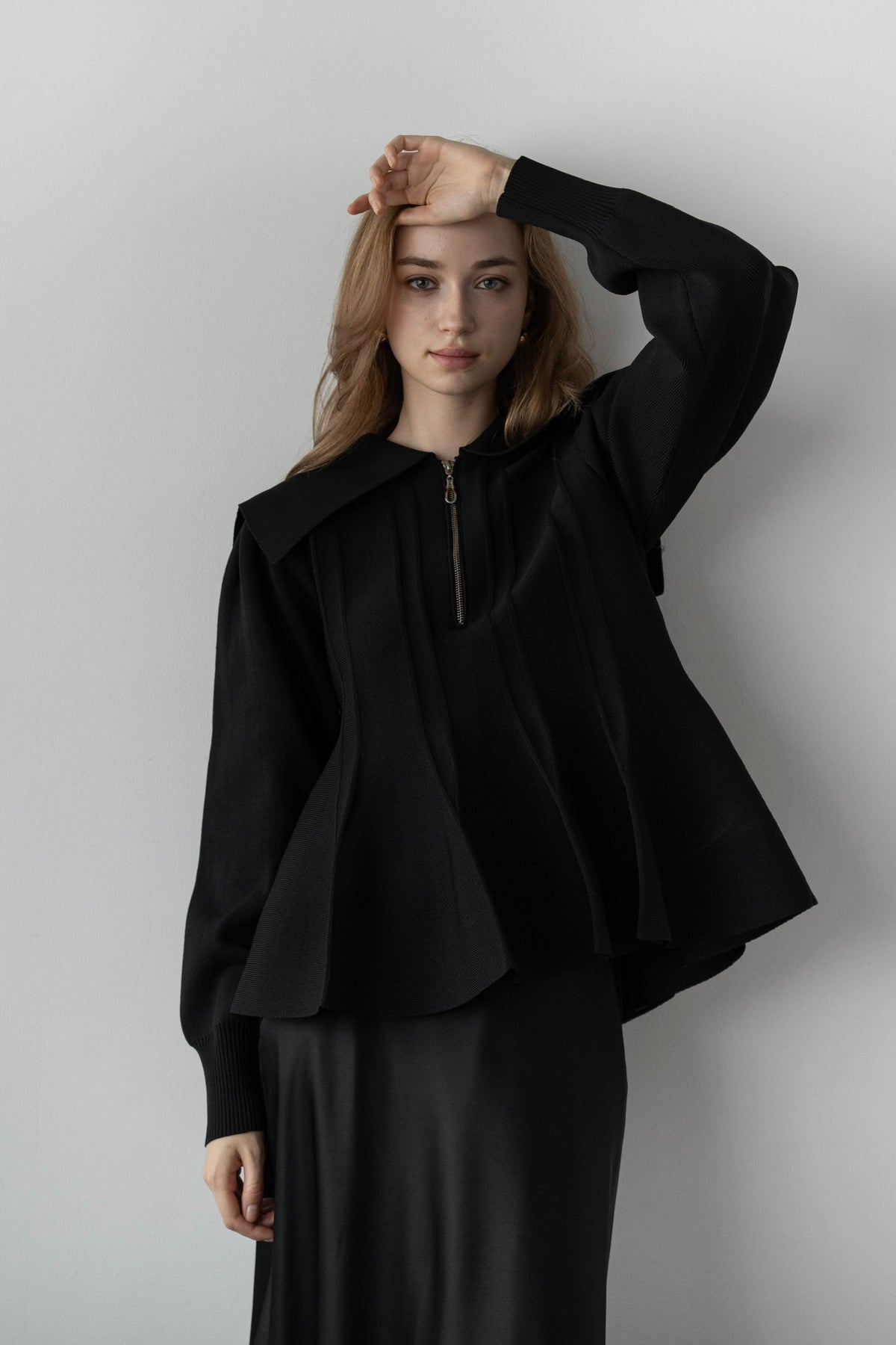 peplum zip knit tops