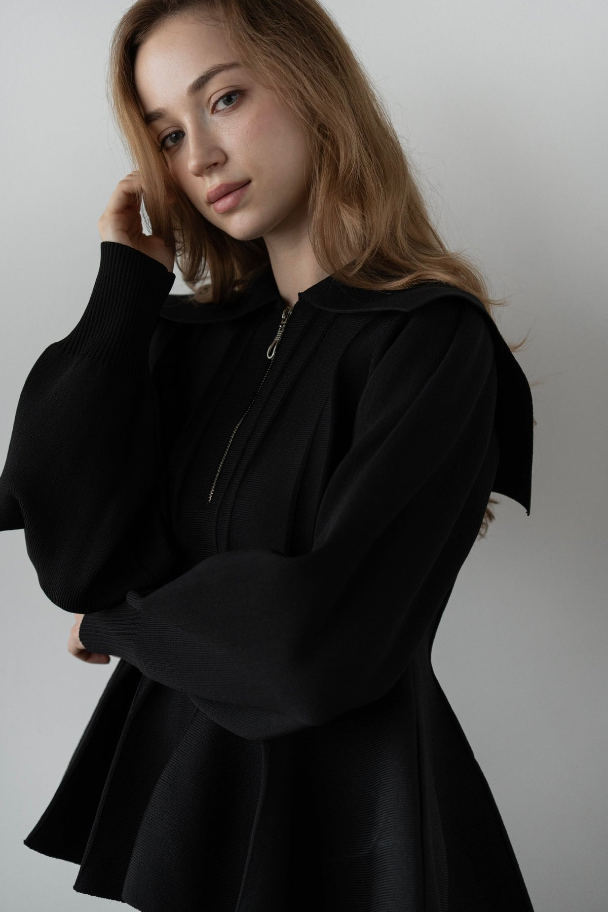 peplum zip knit tops